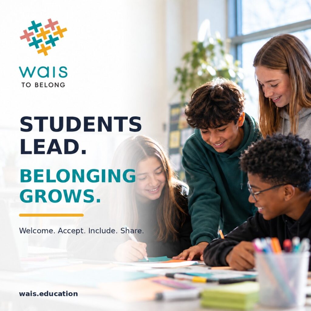 Students lead. Belonging grows. Four students working together at a classroom table with the WAIS to Belong logo